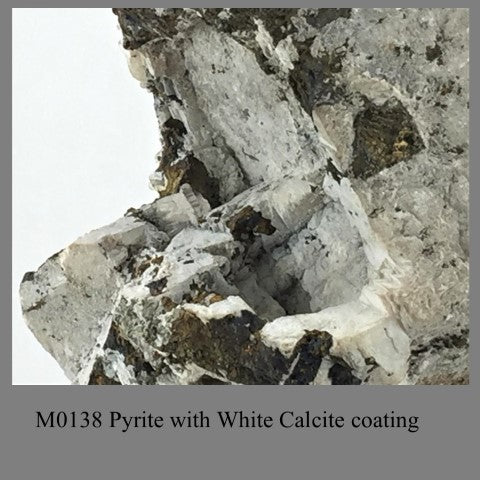 M0138 Pyrite with White Calcite coating