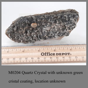 M0204 Quartz Crystal with unknown green cristal coating