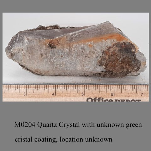 M0204 Quartz Crystal with unknown green cristal coating