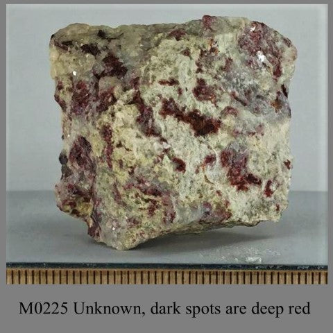 M0225 Unknown, dark spots are deep red