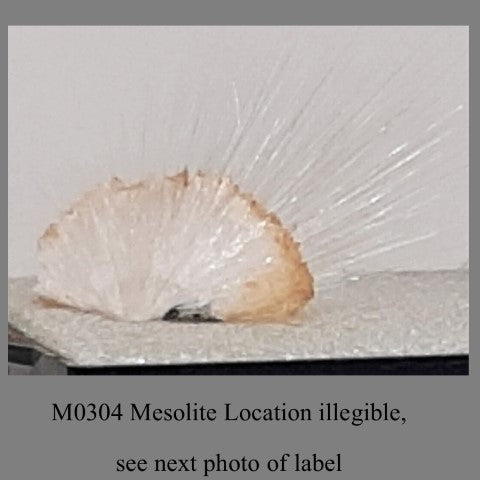 M0304 Mesolite Location illegible, photo of Label