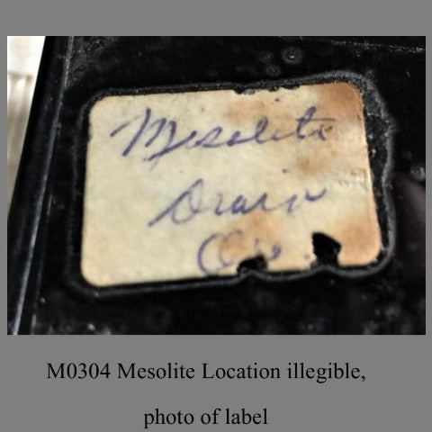 M0304 Mesolite Location illegible, photo of Label